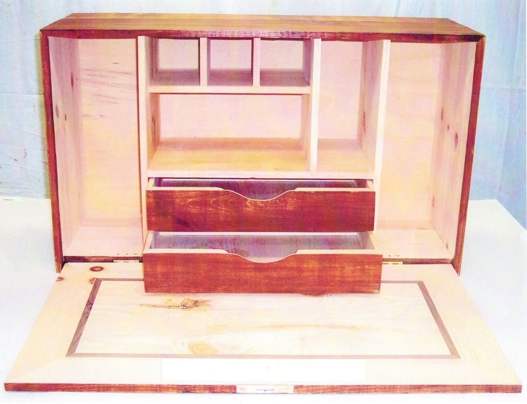 A wooden box with two drawers and a tray.