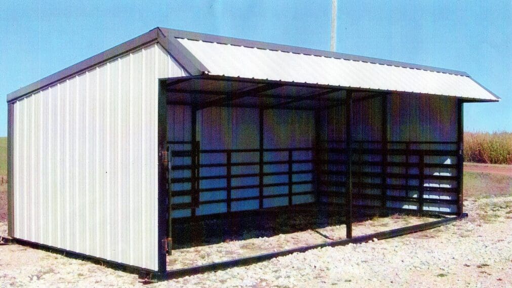 A white and black shelter with metal bars.